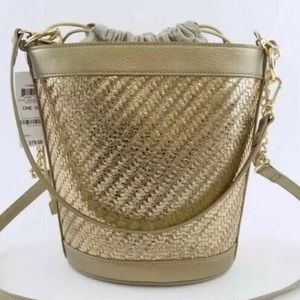 INC Ajae woven bucket crossbody gold